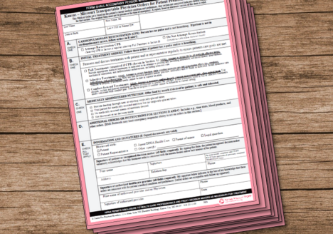 A stack of TPOPP forms on a table.