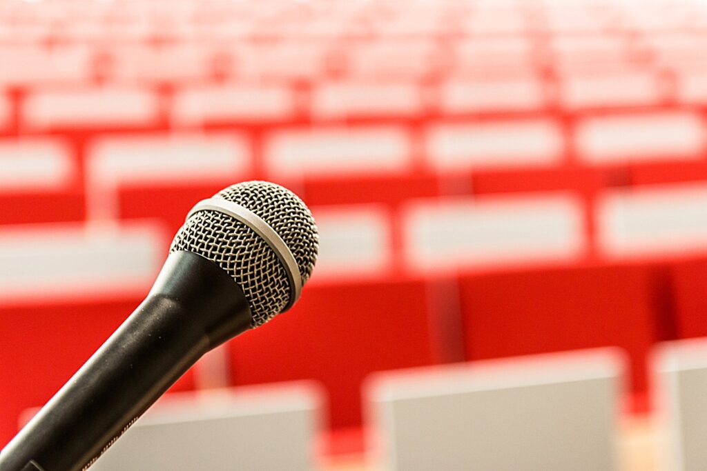 Empty lecture hall and microphone.