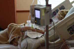 A patient in a hospital bed.