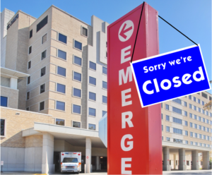 Hospital with a closed sign at entrance.