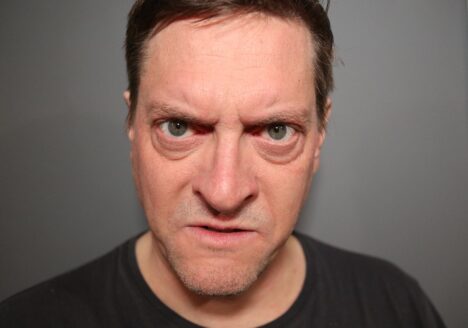 Man with an angry face.