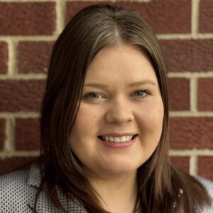 Headshot of Abby Gast-Waterson.