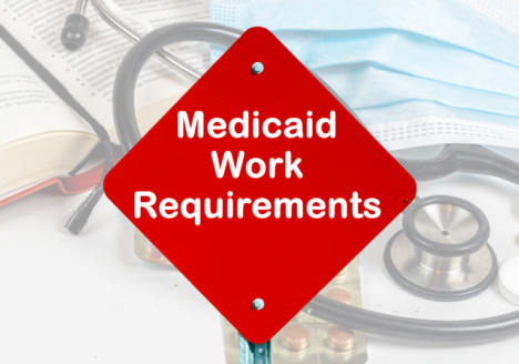 Medicaid work requirements words on a caution sign.