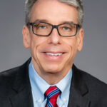 Portrait of Dr. Mark G. Kuczewski.